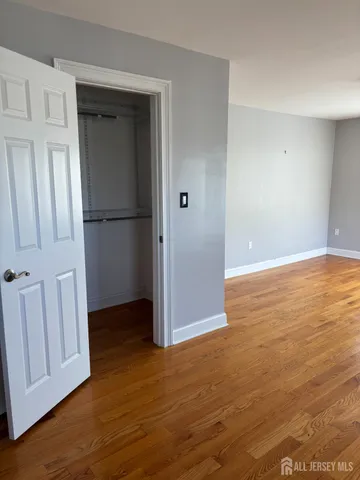 a bathroom with a shower and bathtub