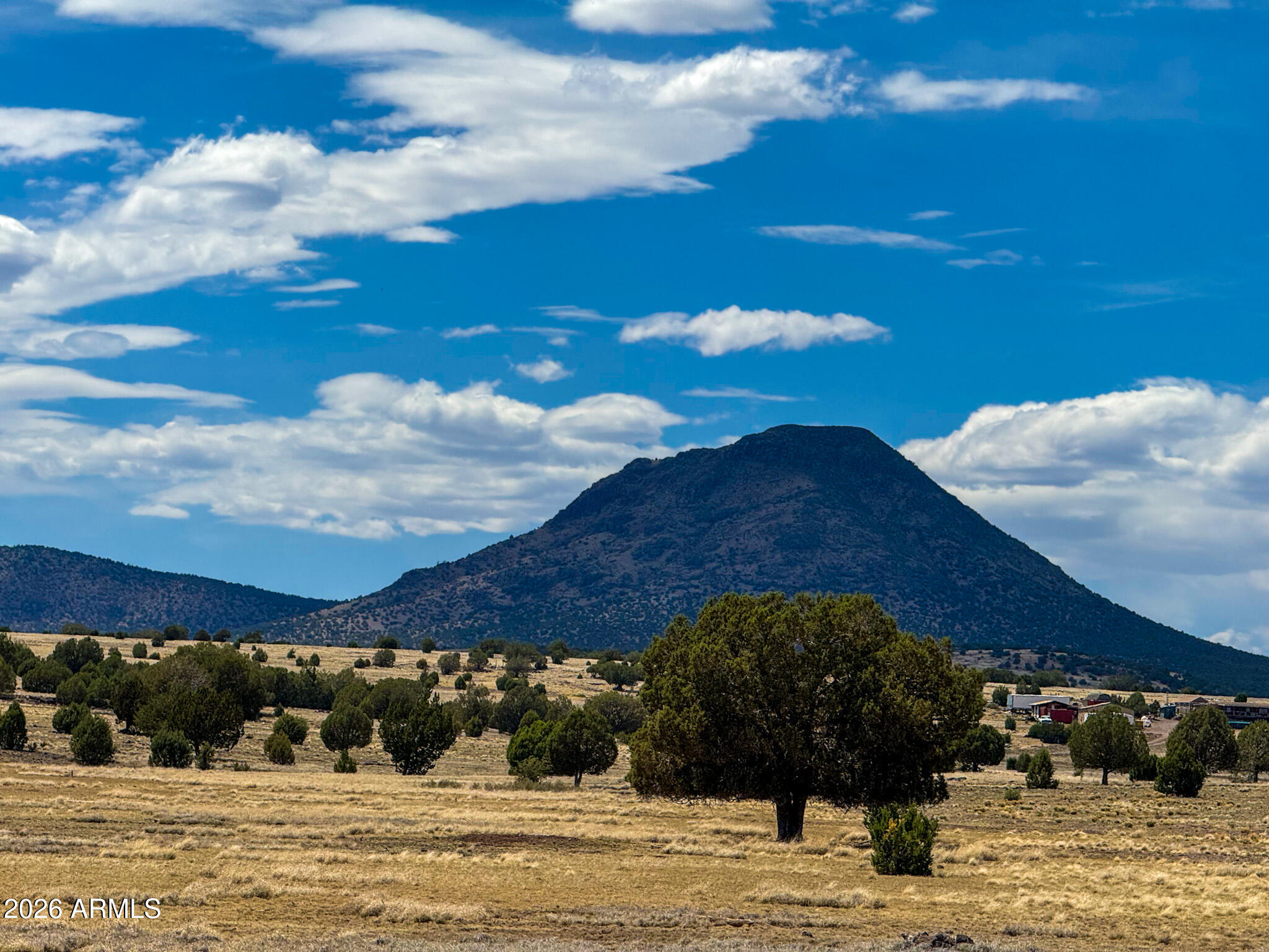 0 West Mile High Road, Unit 84 Ash Fork, AZ 86320 - Photo 19 of 27 a view of a house with a yard