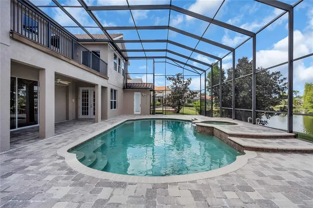 a view of a house with swimming pool