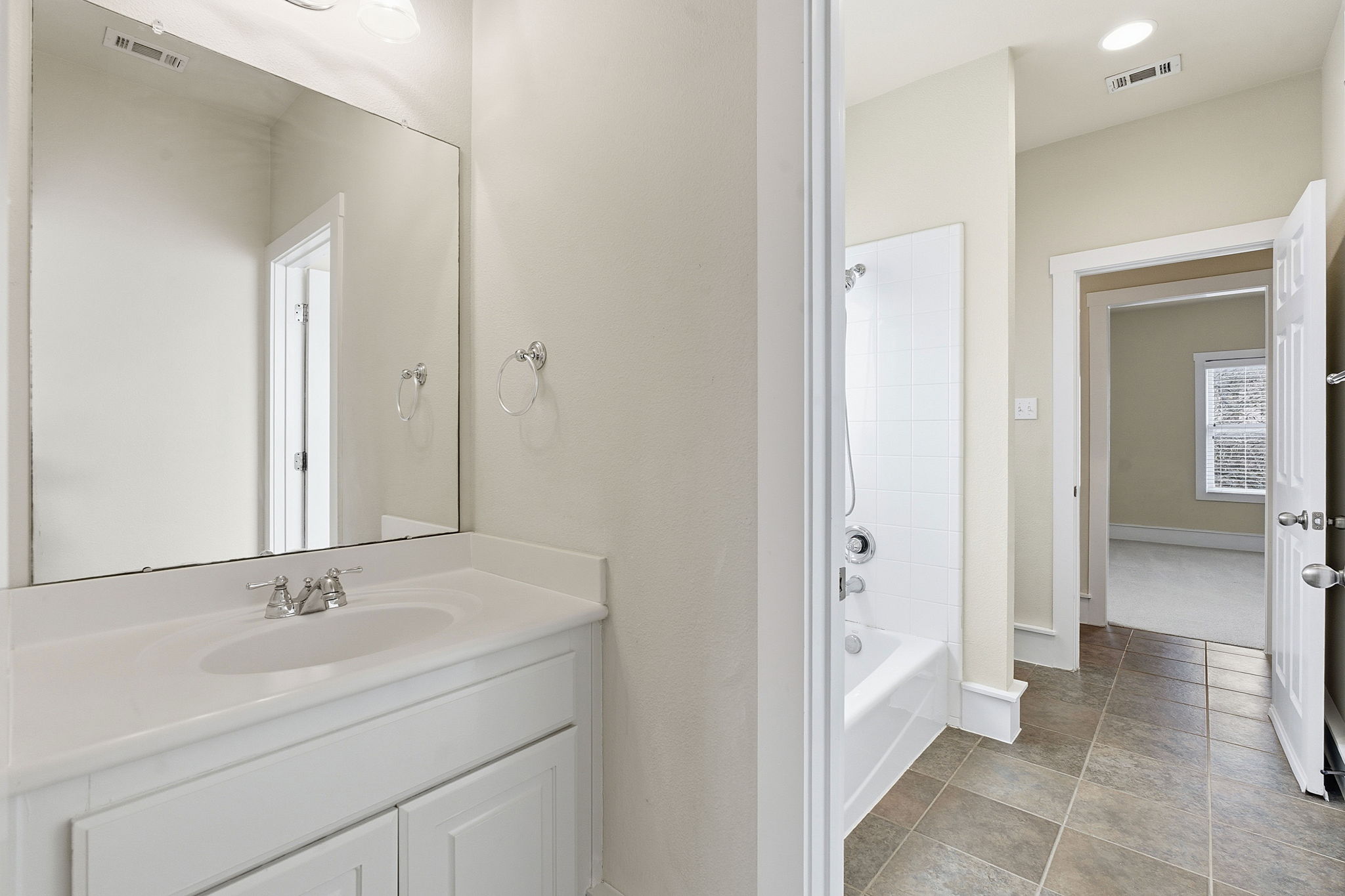 2506 Enfield Road, Unit B Austin, TX 78703 - Photo 30 of 40 a bathroom with a sink and a mirror