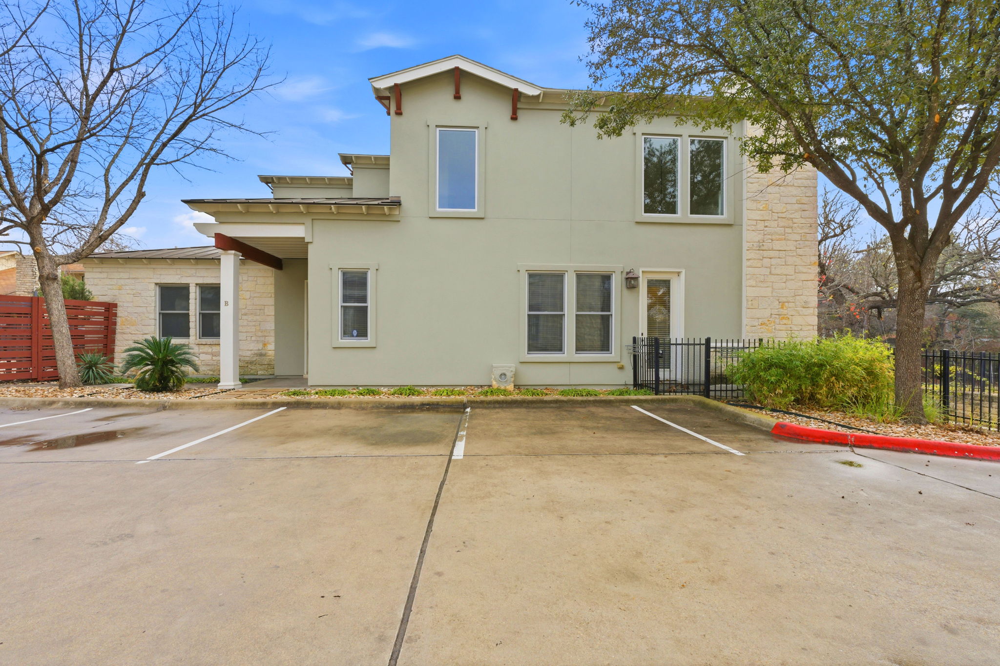 2506 Enfield Road, Unit B Austin, TX 78703 - Photo 4 of 40 front view of a house with a yard