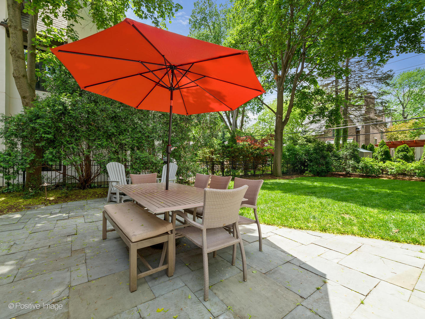 308 North County Line Road Hinsdale, IL 60521 - Photo 37 of 40 a patio with a patio table and chairs