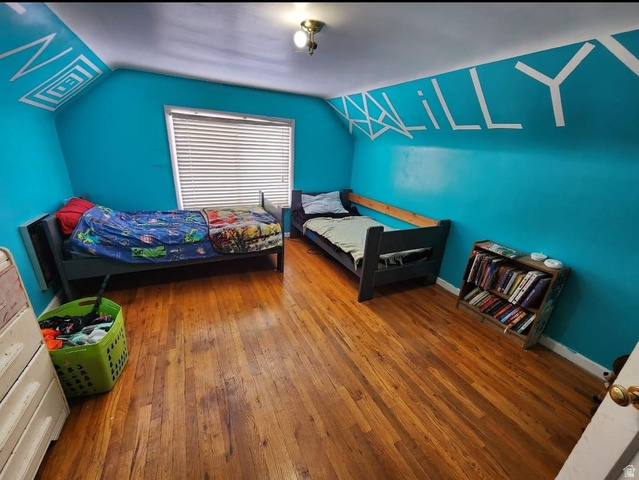 102 South Main Street Paris, ID 83261 - Photo 23 of 33 Bedroom featuring hardwood / wood-style floors