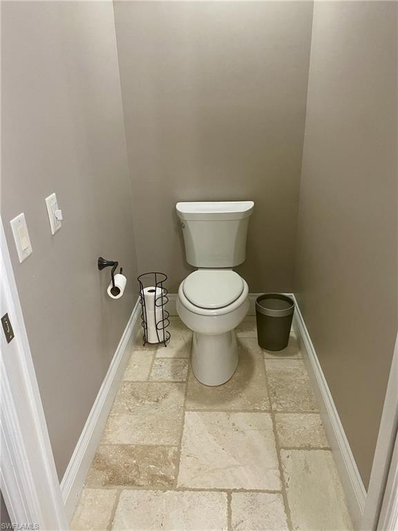 9035 Spring Run Boulevard Estero, FL 34135 - Photo 9 of 9 Bathroom with stone tile flooring