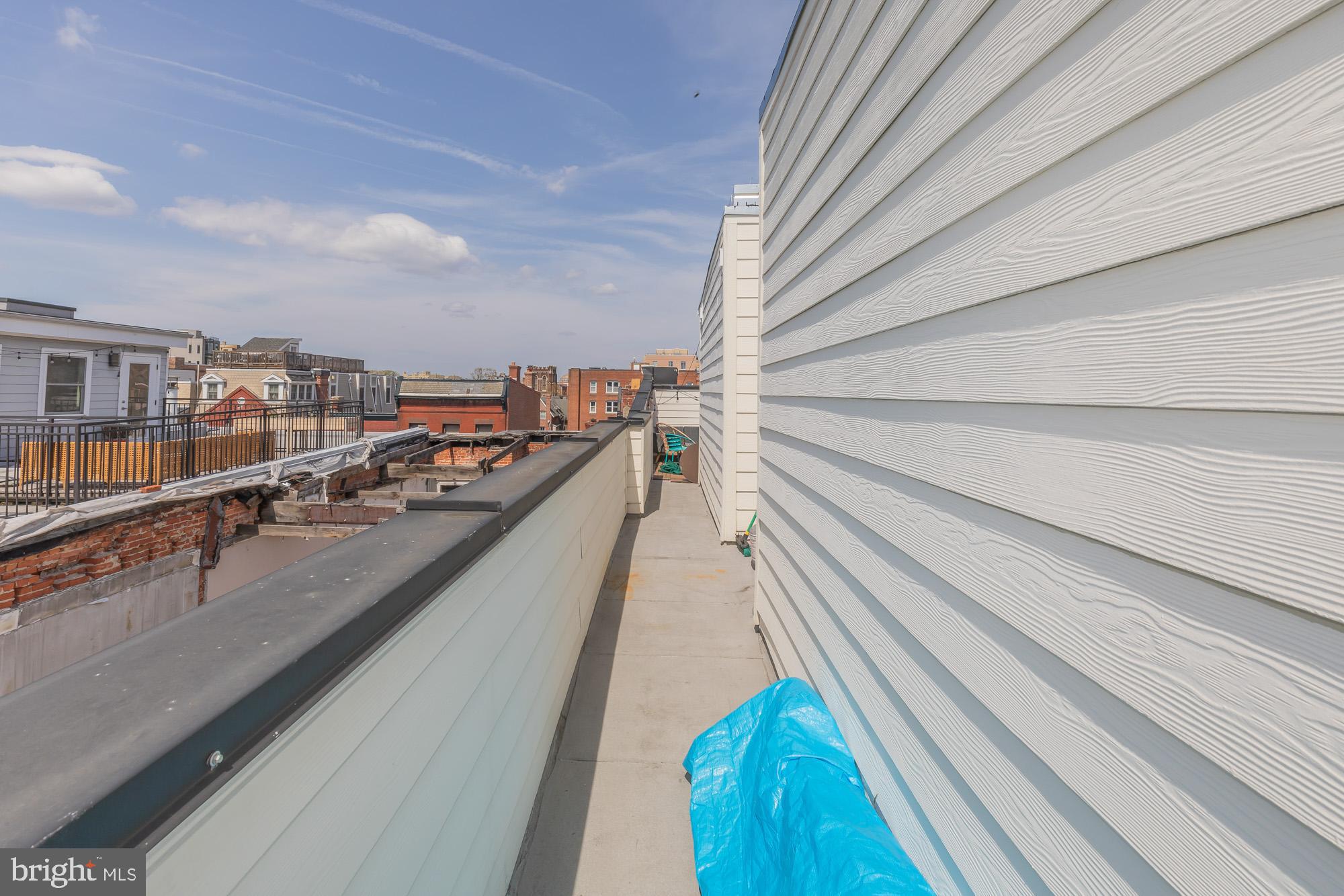 1444 Harvard Street Northwest, Unit 302 Washington, DC 20009 - Photo 45 of 50 a view of a balcony with an ocean view
