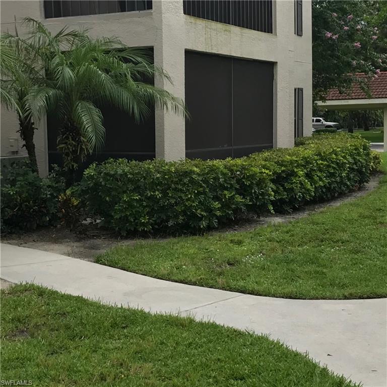 2214 Arbour Walk Circle, Unit 2012 Naples, FL 34109 - Photo 6 of 17 a view of garden with small space