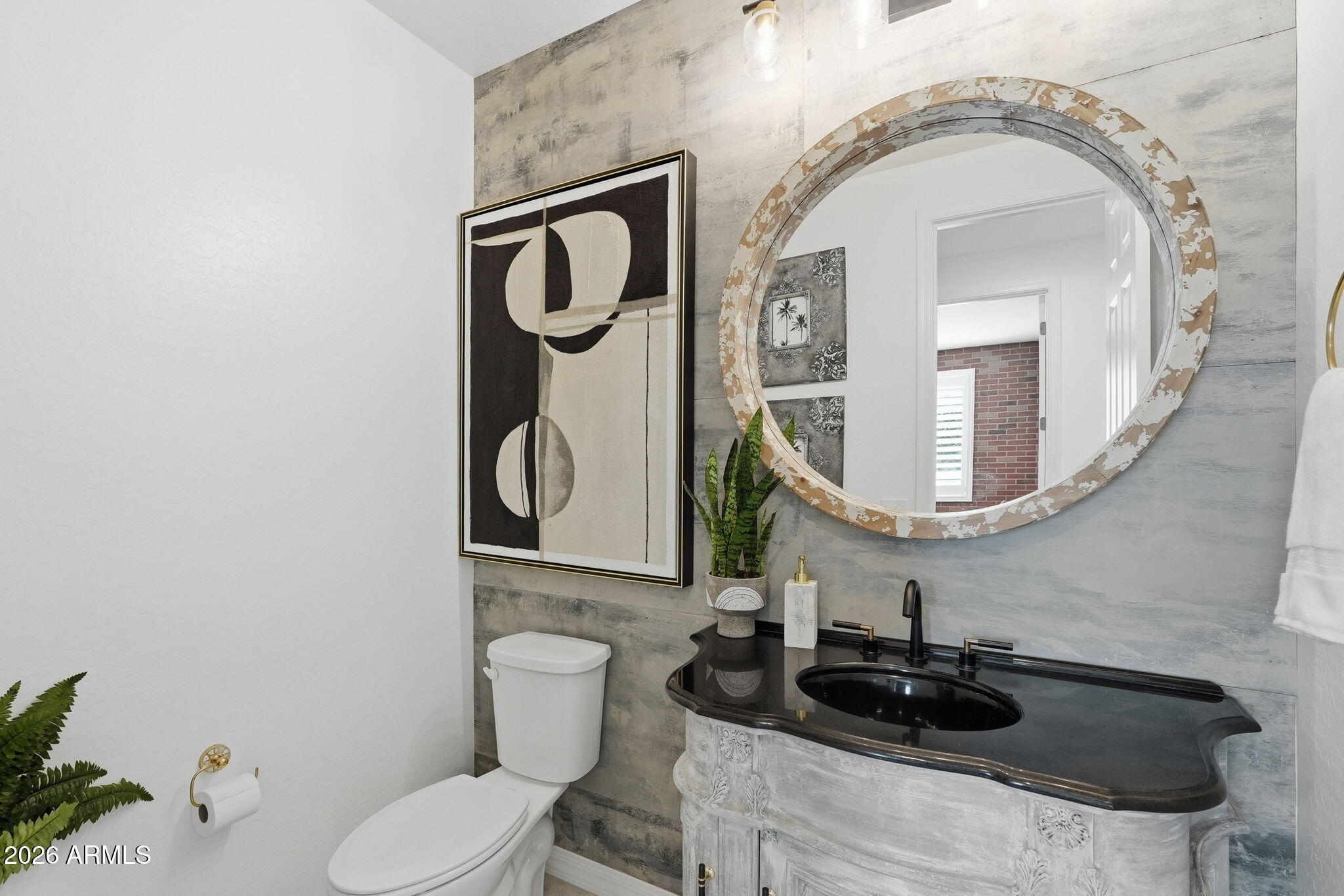 22607 East Russet Road Queen Creek, AZ 85142 - Photo 40 of 64 a bathroom with a toilet and a sink
