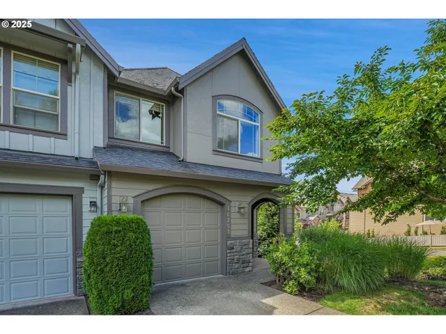 a view of a backyard of the house