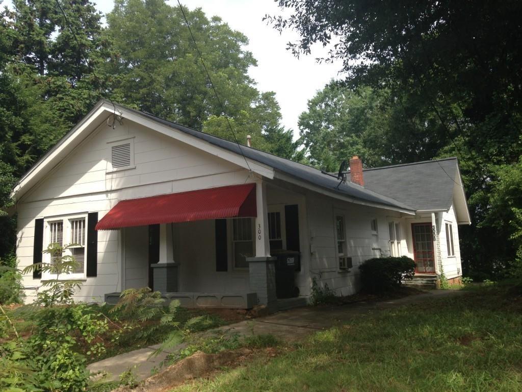 300 Ridgewood Avenue, Unit B Gainesville, GA 30501 - Photo 1 of 1 a view of a house with a yard