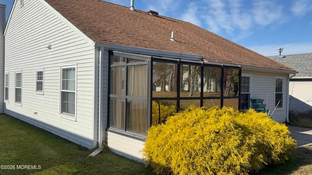 a view of a house with a large window