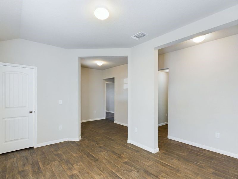 114 Cranbrook Lane Hutto, TX 78634 - Photo 16 of 38 Unfurnished room featuring dark hardwood / wood-style flooring