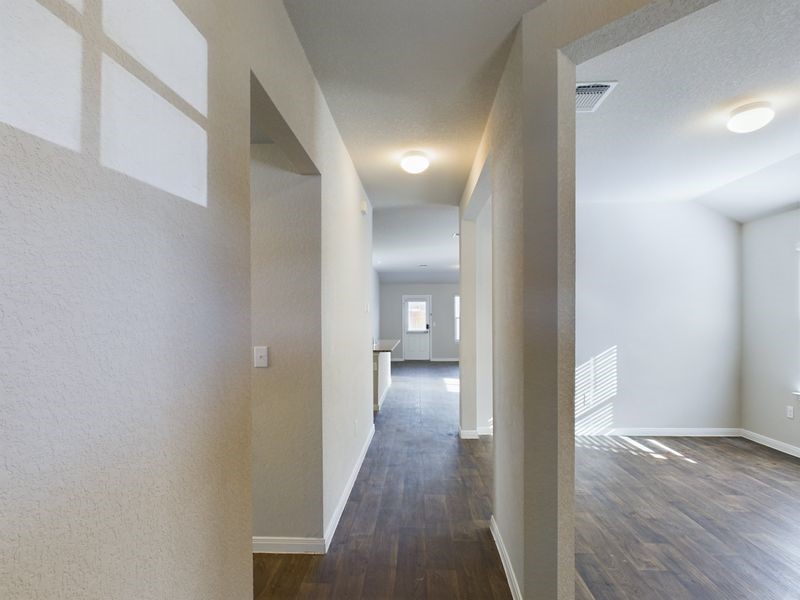 114 Cranbrook Lane Hutto, TX 78634 - Photo 22 of 38 Corridor featuring dark hardwood / wood-style flooring
