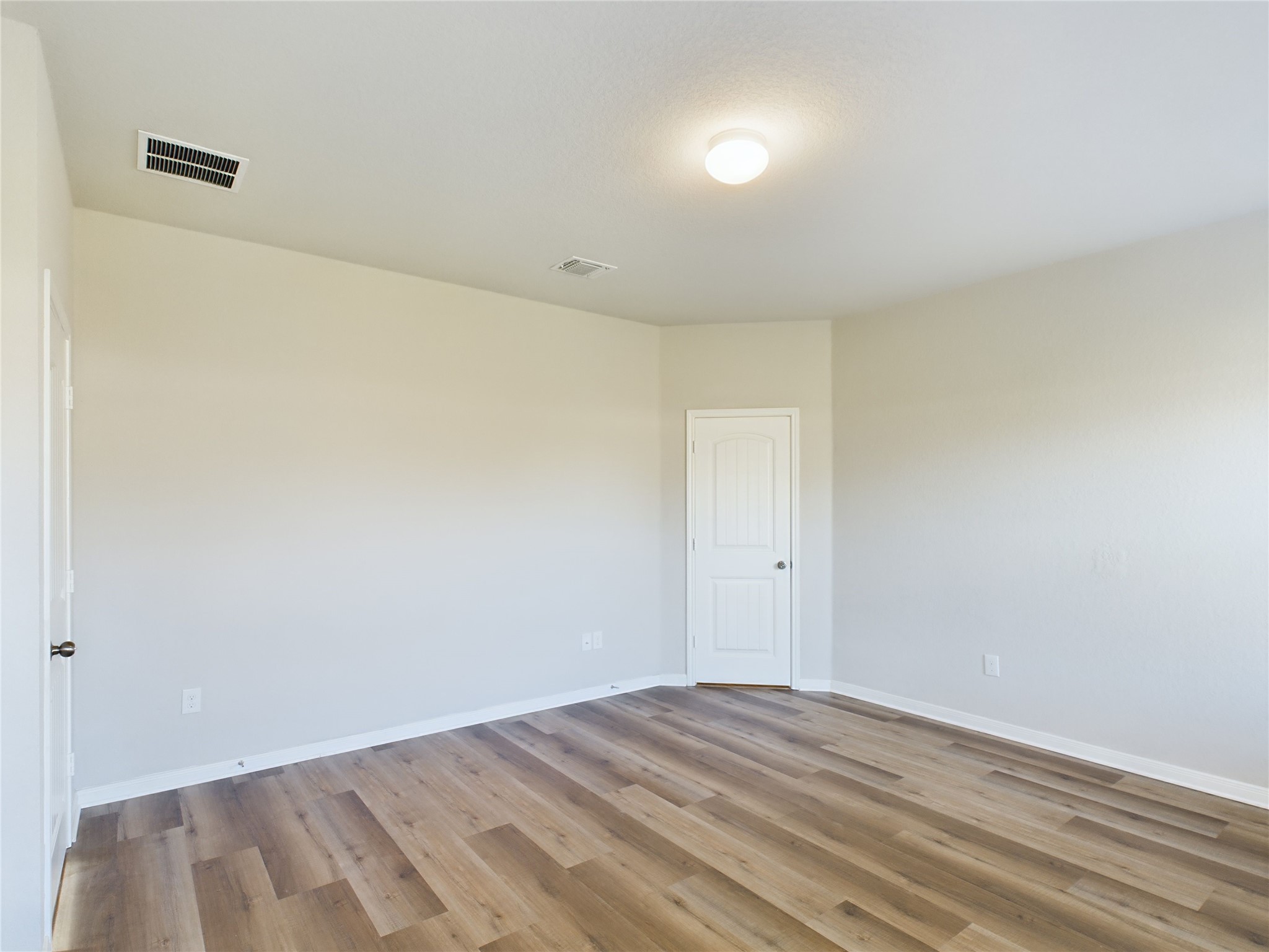 114 Cranbrook Lane Hutto, TX 78634 - Photo 24 of 38 Unfurnished room with light hardwood / wood-style flooring