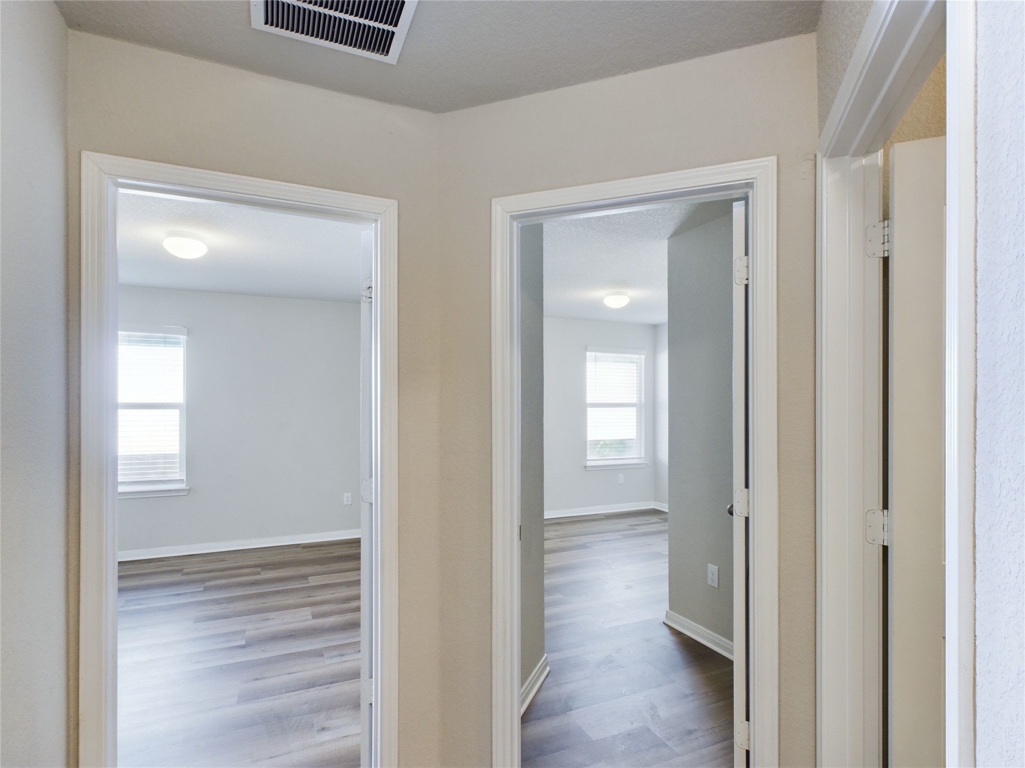 114 Cranbrook Lane Hutto, TX 78634 - Photo 10 of 38 Corridor featuring wood-type flooring