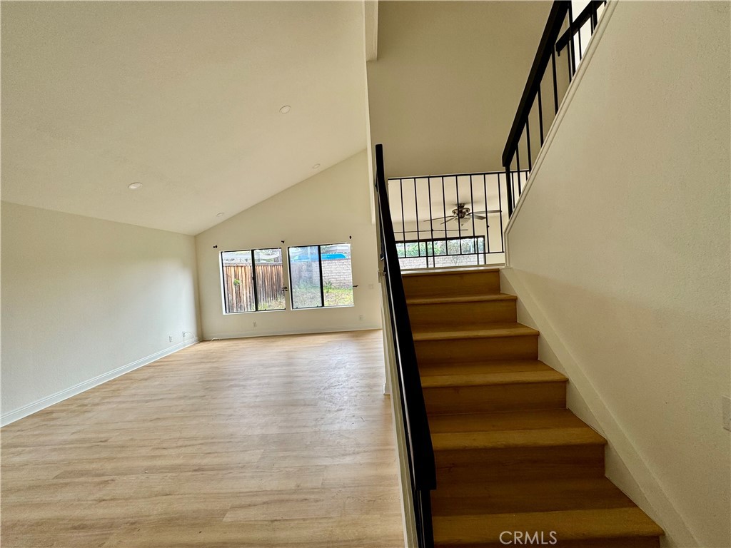 3 Atlanta Irvine, CA 92620 - Photo 9 of 14 a view of staircase with lots of frames and wooden floor