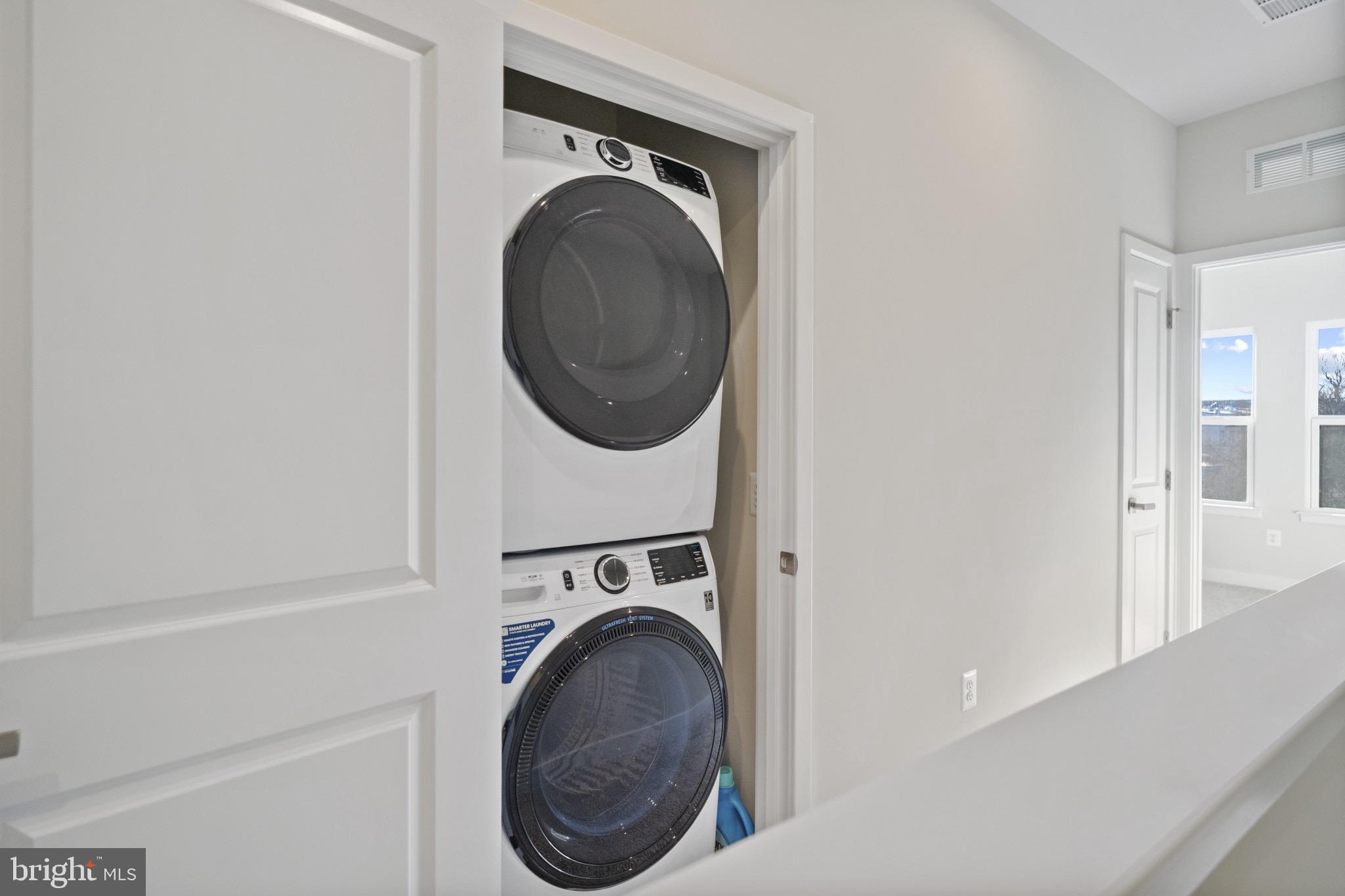 734 Watts Street Baltimore, MD 21217 - Photo 22 of 25 a utility room with dryer and washer