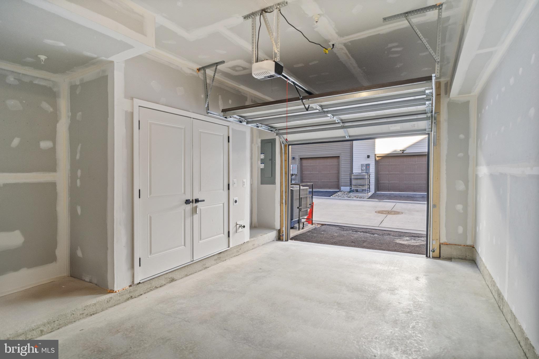 734 Watts Street Baltimore, MD 21217 - Photo 7 of 25 a view of a hallway with wooden cabinet and door