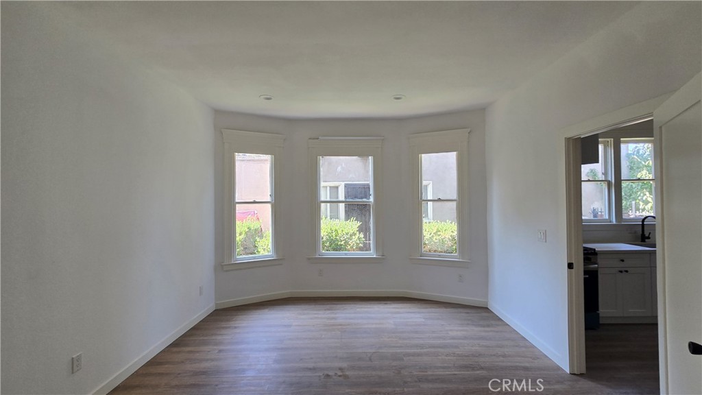 975 North Pk Circle, Unit A Long Beach, CA 90813 - Photo 4 of 8 an empty room with window