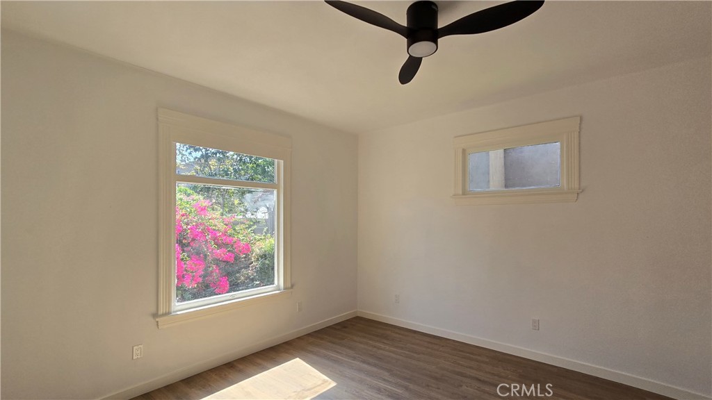 975 North Pk Circle, Unit A Long Beach, CA 90813 - Photo 6 of 8 a view of a room with window and hardwood floor