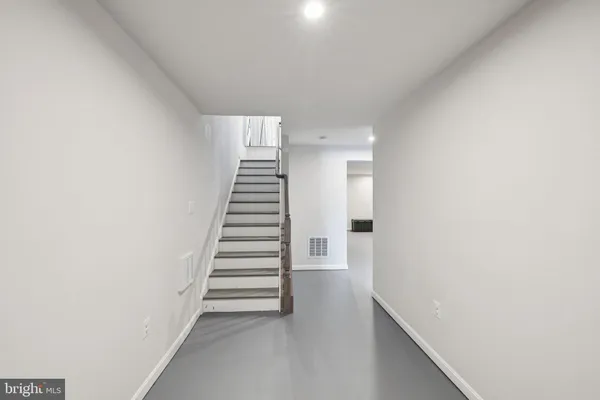 a view of entryway with stairs