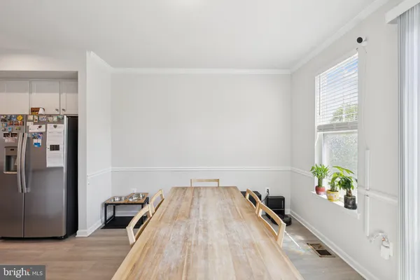 a view of a living room with a rug