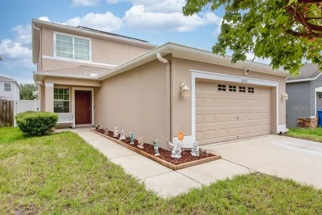 a front view of house with yard