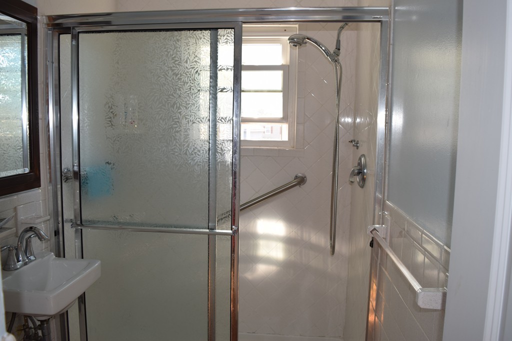 32 Rita Street Springfield, MA 01118 - Photo 16 of 29 a bathroom with a shower and a sink