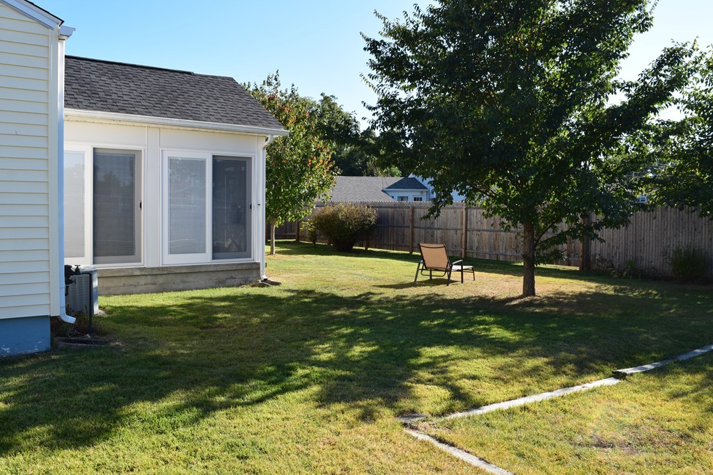32 Rita Street Springfield, MA 01118 - Photo 26 of 29 a swimming pool with wooden fence