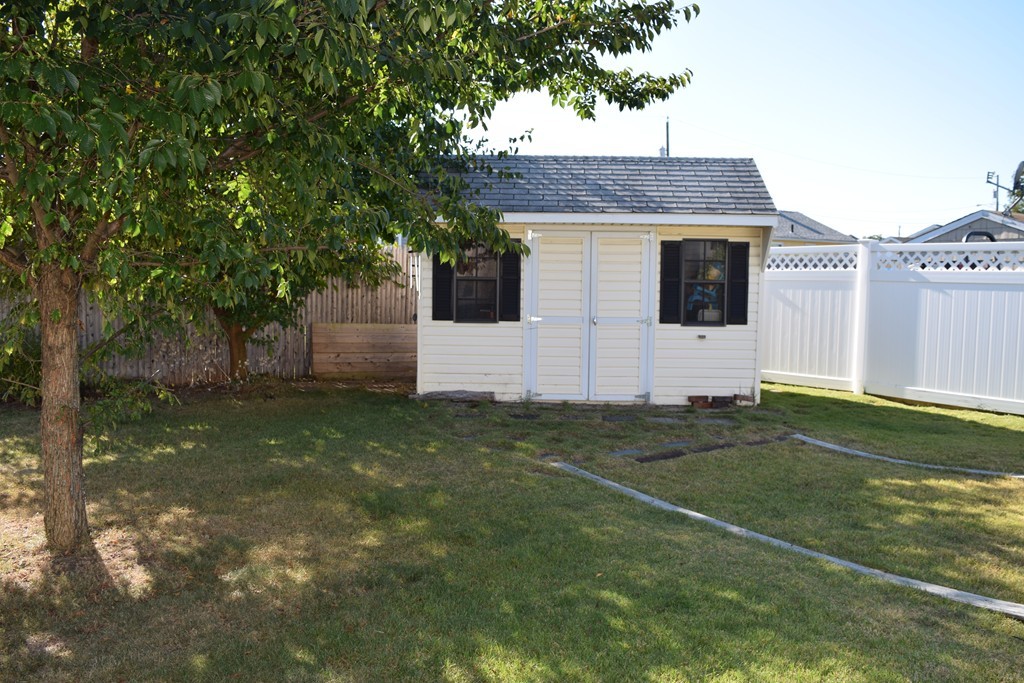 32 Rita Street Springfield, MA 01118 - Photo 27 of 29 a front view of a house with garden