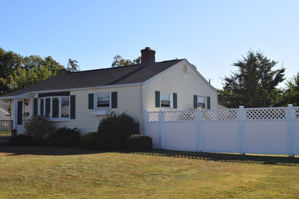 32 Rita Street Springfield, MA 01118 - Photo 3 of 29 a front view of a house with a yard