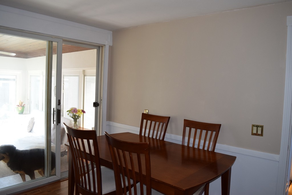 32 Rita Street Springfield, MA 01118 - Photo 10 of 29 a view of a dining room with furniture and wooden floor