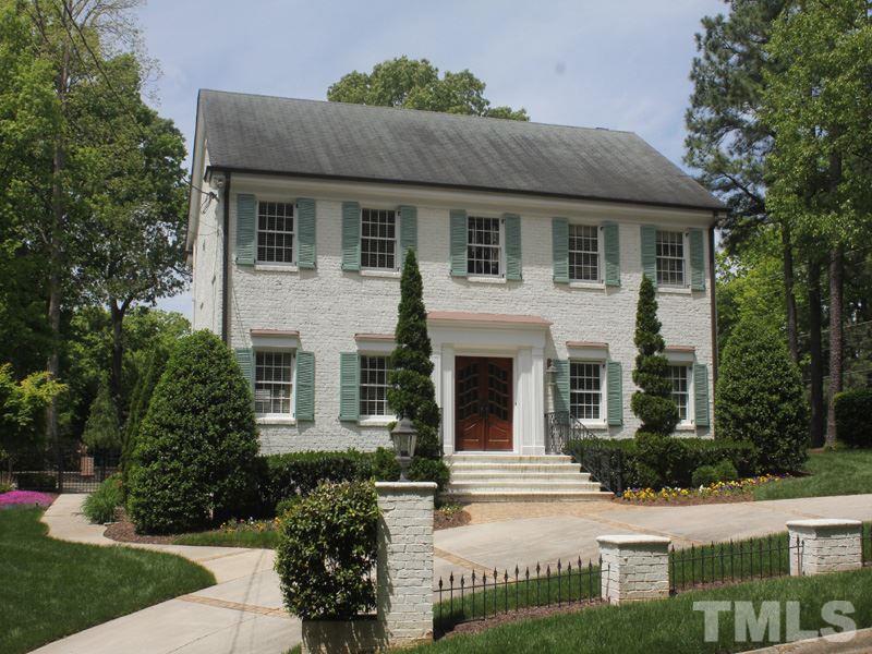 2305 Tyson Street Raleigh, NC 27612 - Photo 1 of 25 a front view of a house with a garden