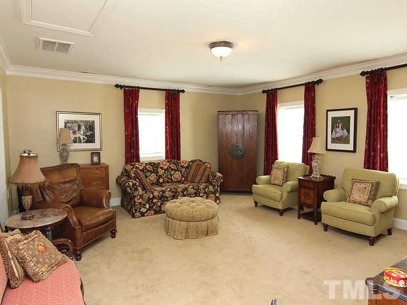 2305 Tyson Street Raleigh, NC 27612 - Photo 13 of 25 a living room with furniture and a large window