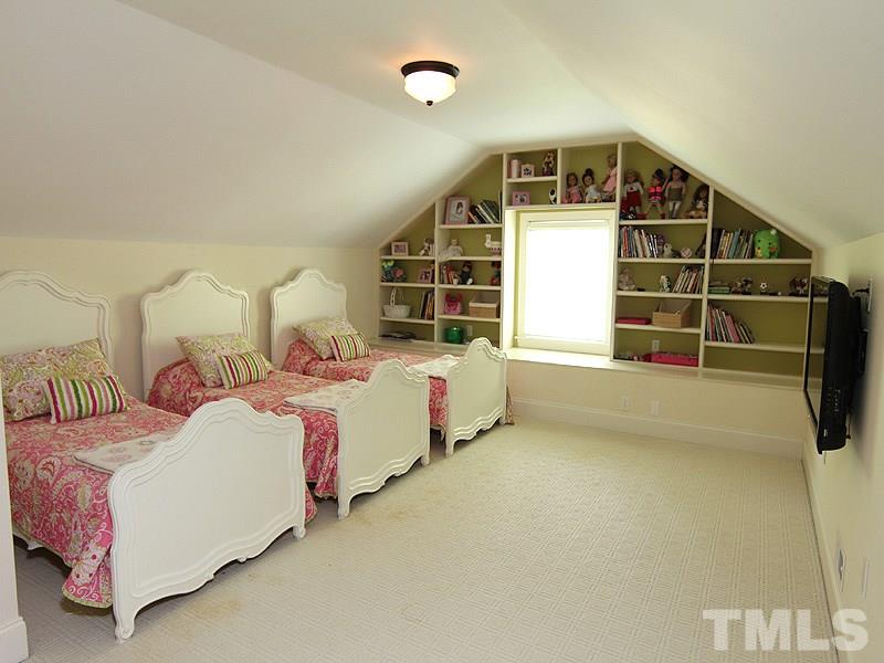 2305 Tyson Street Raleigh, NC 27612 - Photo 19 of 25 a bedroom with bed and a window