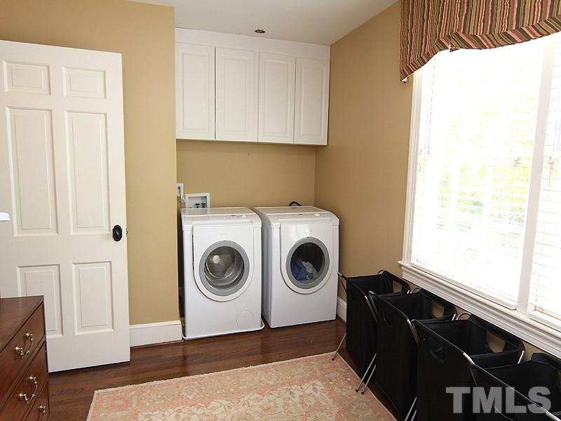 2305 Tyson Street Raleigh, NC 27612 - Photo 20 of 25 a utility room with dryer and washer