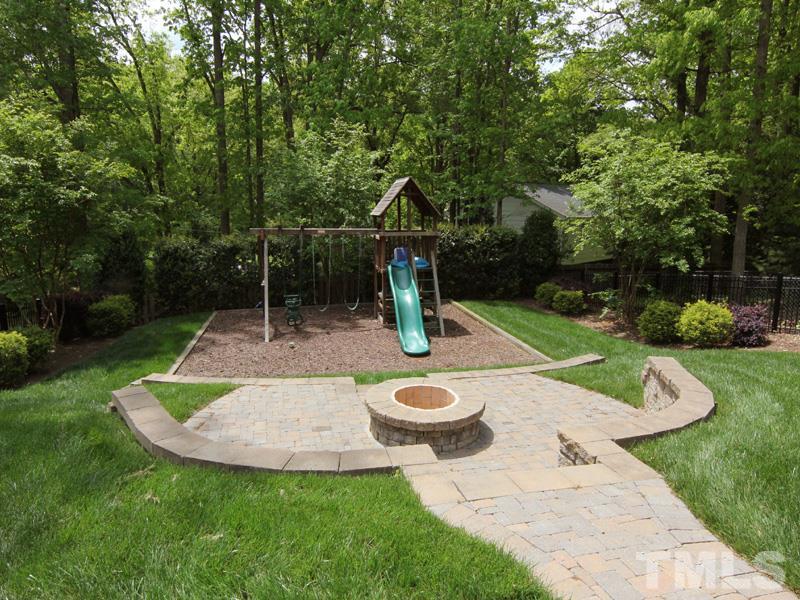2305 Tyson Street Raleigh, NC 27612 - Photo 25 of 25 a view of a backyard with sitting area
