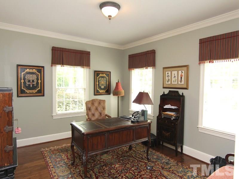 2305 Tyson Street Raleigh, NC 27612 - Photo 6 of 25 a living room with furniture and a window