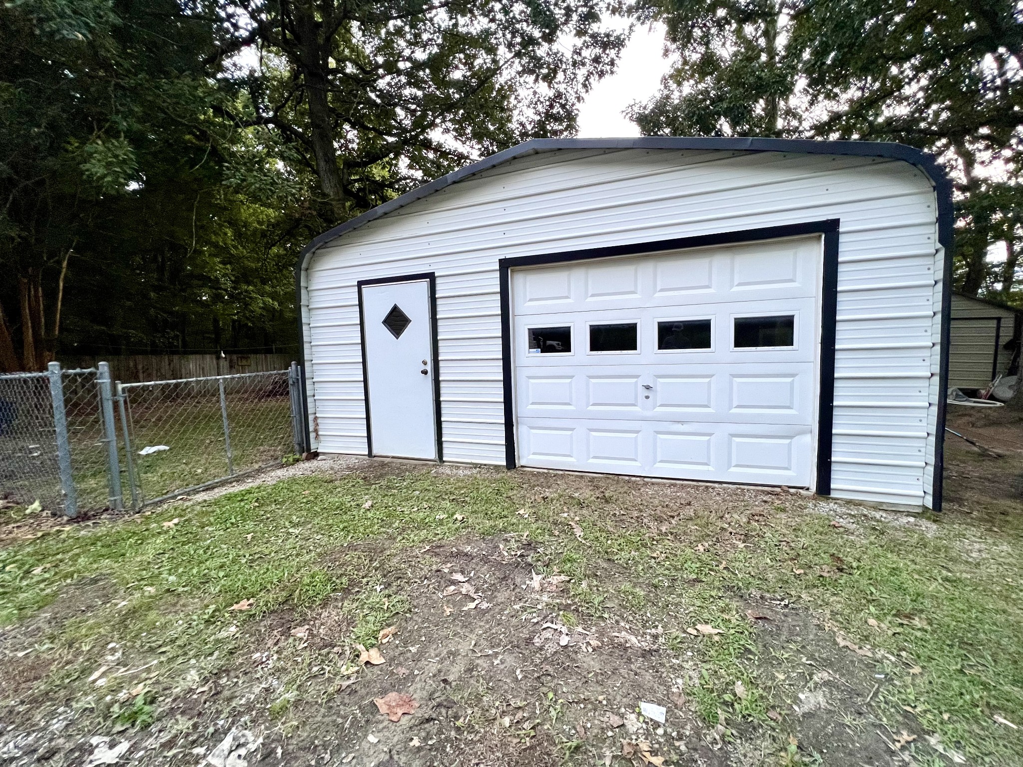 413 Elm Lane Beechgrove, TN 37018 - Photo 14 of 15 a backyard of a house with lots of green space