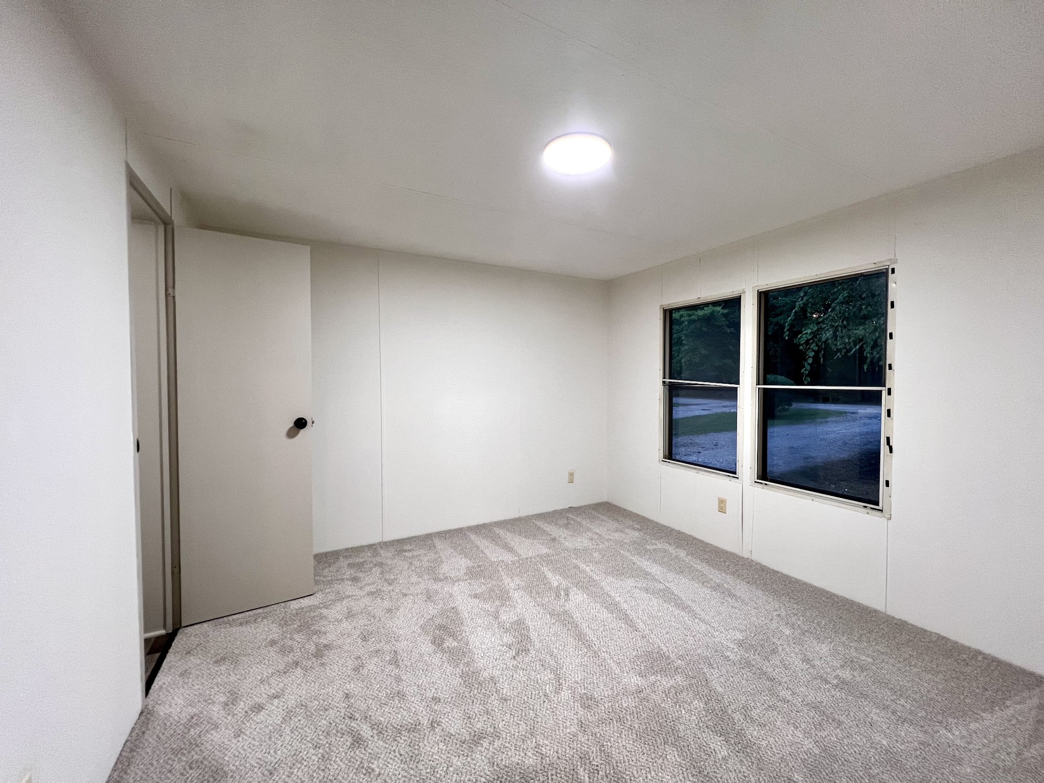 413 Elm Lane Beechgrove, TN 37018 - Photo 6 of 15 a view of an empty room with a window