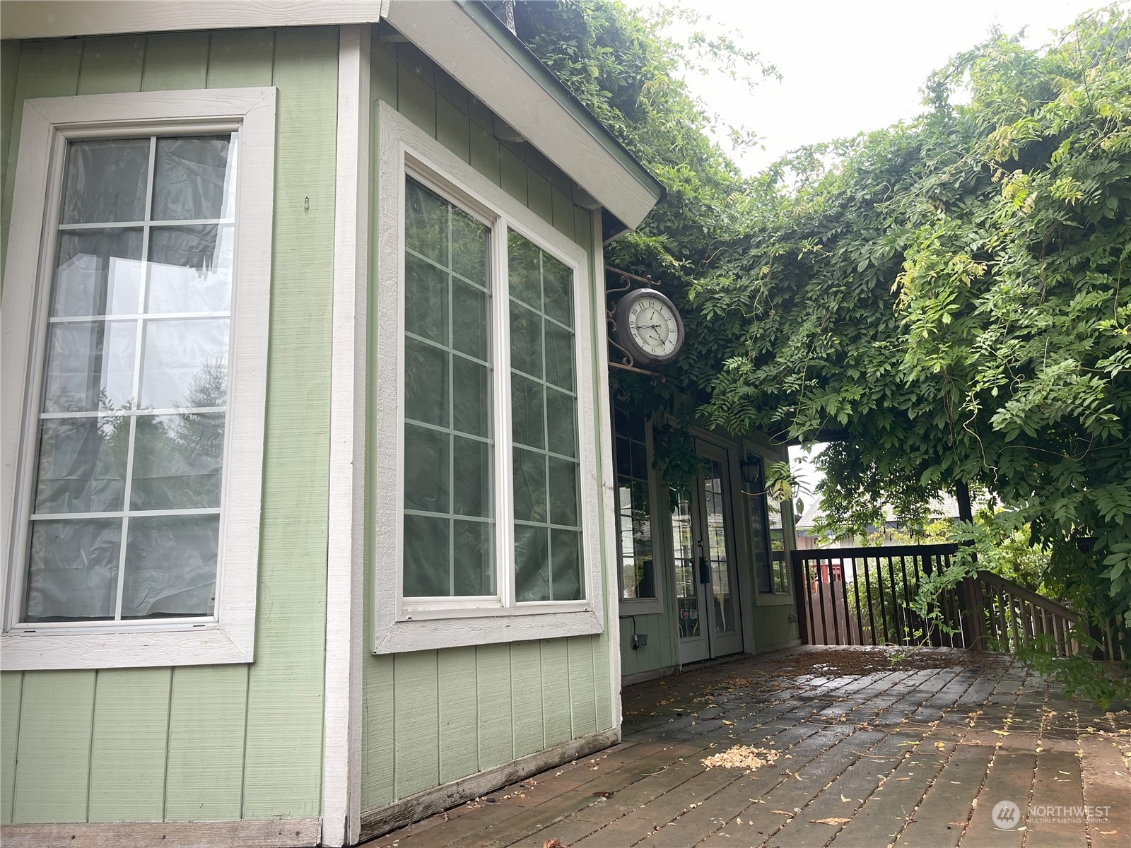 4902 241st Street Southwest Mountlake Terrace, WA 98043 - Photo 8 of 28 a front view of a house with a large window