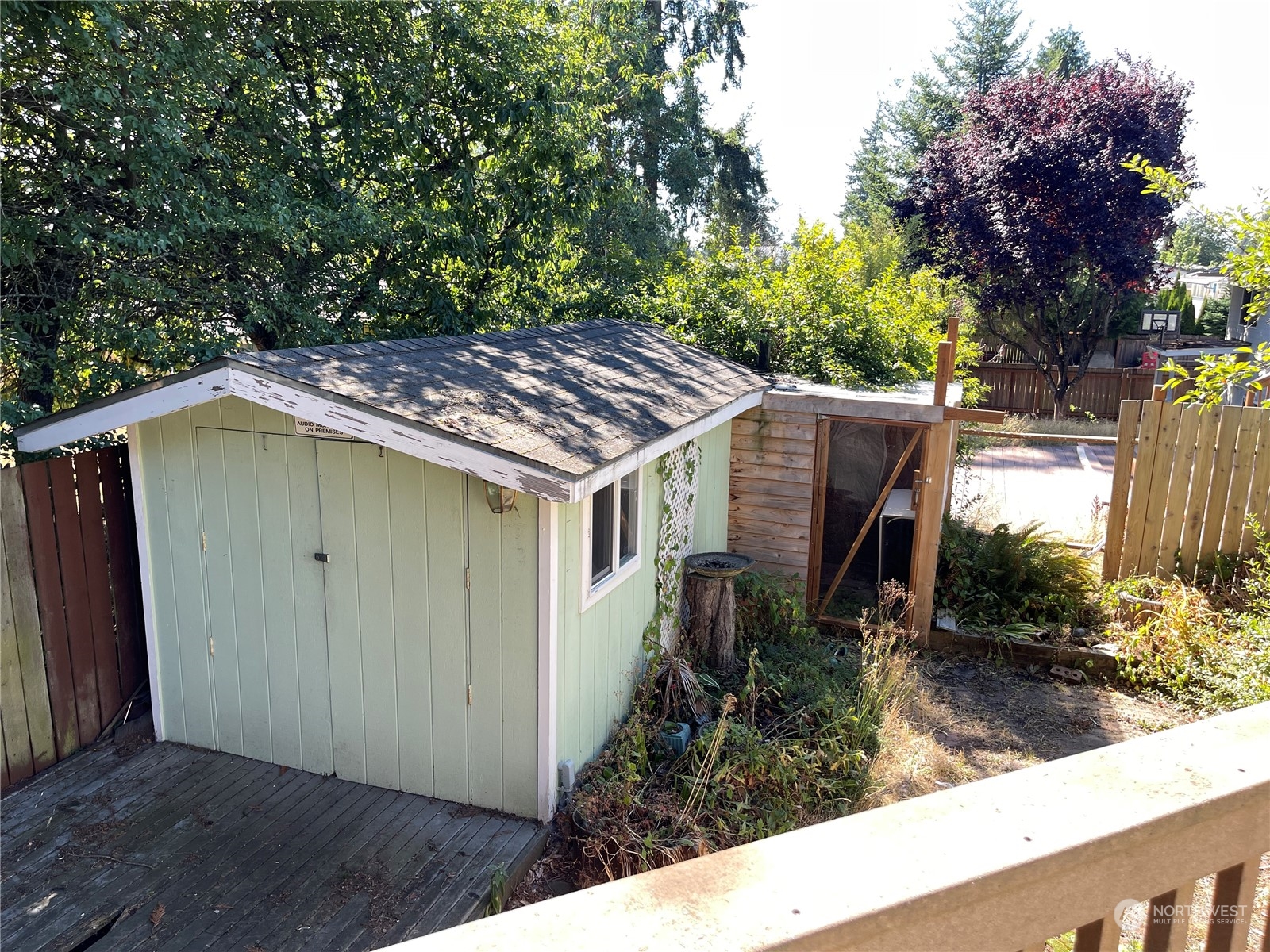 4902 241st Street Southwest Mountlake Terrace, WA 98043 - Photo 10 of 28 a view of house with trees in the background