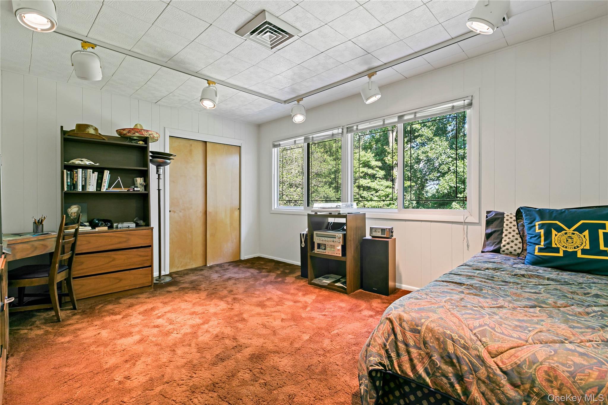 16 Meadow Road Scarsdale, NY 10583 - Photo 25 of 47 a bedroom with a bed and a large window