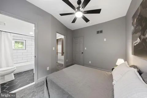 a view of a living room and entry way