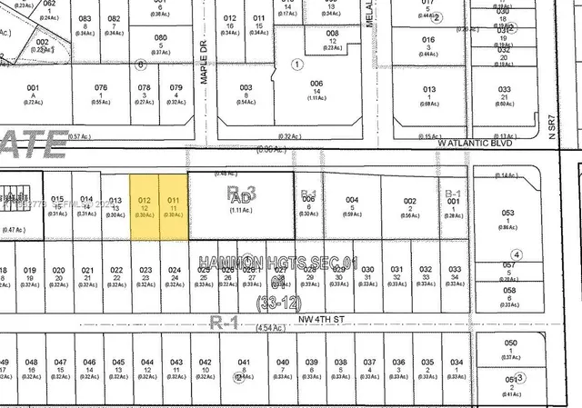 a black and white photo of a glass door