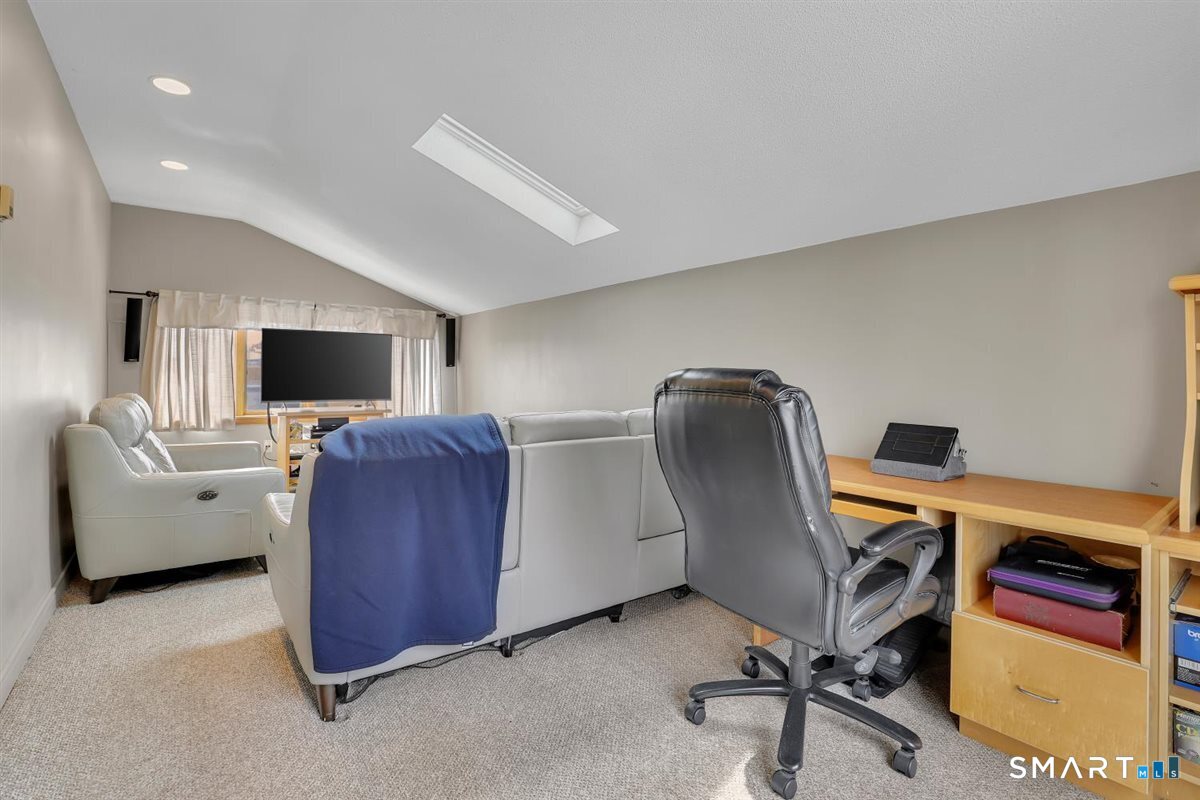 236 Cross Street Middletown, CT 06457 - Photo 23 of 39 The wall space in this family room allows for book shelves to create your personal library/ media room, home office or a theater room.