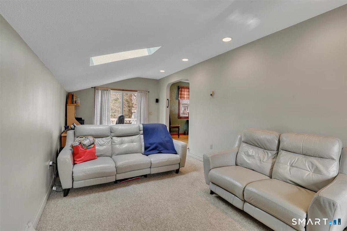 236 Cross Street Middletown, CT 06457 - Photo 25 of 39 Sliding glass doors leading to the deck for outside entertaining.