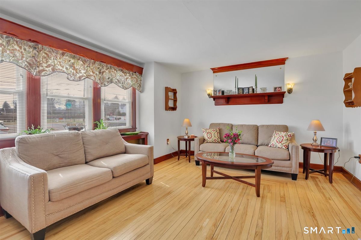 236 Cross Street Middletown, CT 06457 - Photo 6 of 39 South facing so you can enjoy full sun for a better part of the day. Every window in this home is adorned in a custom shade.