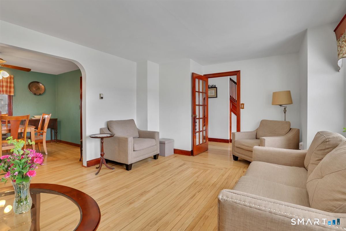 236 Cross Street Middletown, CT 06457 - Photo 9 of 39 Gentle arches add charm and character along with divided glass panel doors.