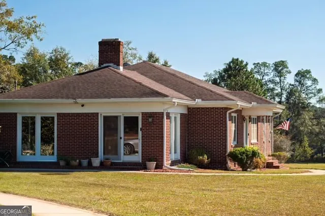 a front view of a house with garage