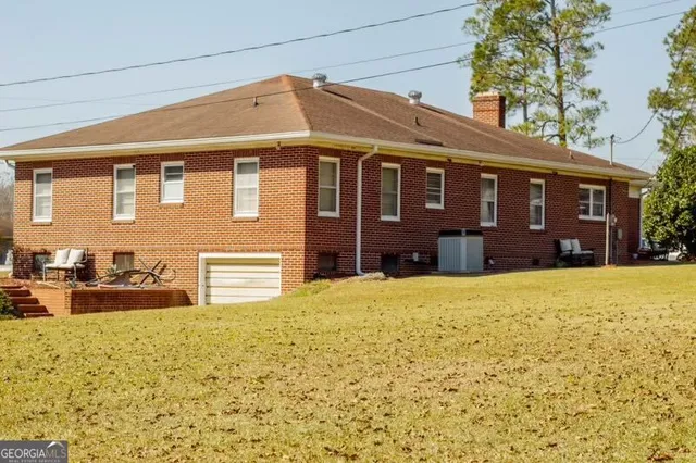 a front view of a house having yard